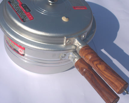 silver steel Pressure Cooker wooden handle - national pressure cooker by Cooknex at low price in Pakistan