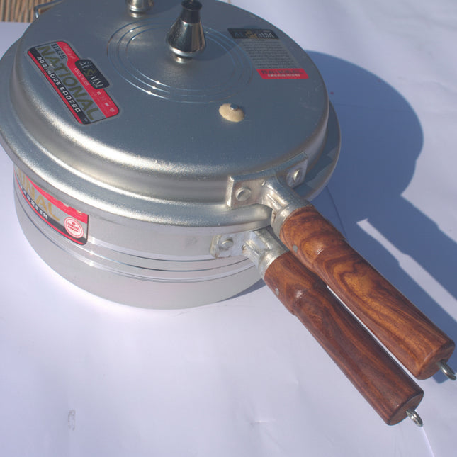 silver steel Pressure Cooker wooden handle - national pressure cooker by Cooknex at low price in Pakistan