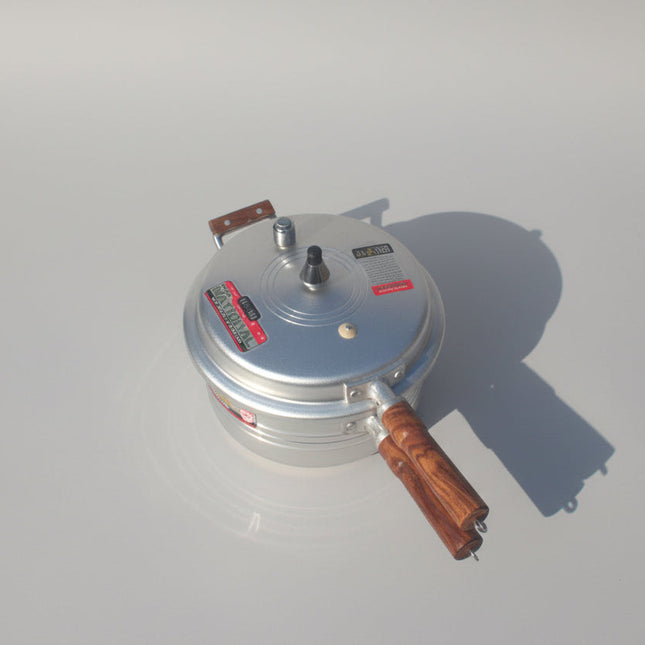 silver steel Pressure Cooker wooden handle - national pressure cooker by Cooknex at low price in Pakistan