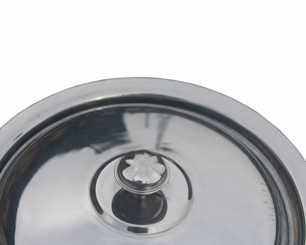 Close-up of a metallic lid of food container with a central knob at sale price by cooknex