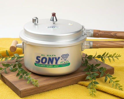 Silver pressure cooker with wooden handles sony instant cooking pot by cooknex at best price in Pakistan